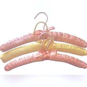 Three Luxurious Padded Satin Hangers-2 Pink and 1 Yellow Hanger.